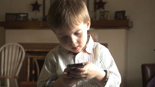 Little boy using smartphone